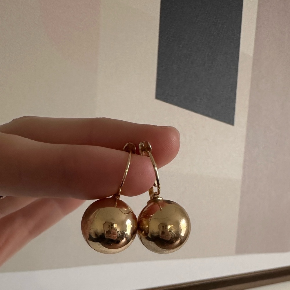 Gold tone earrings, drop ball, party